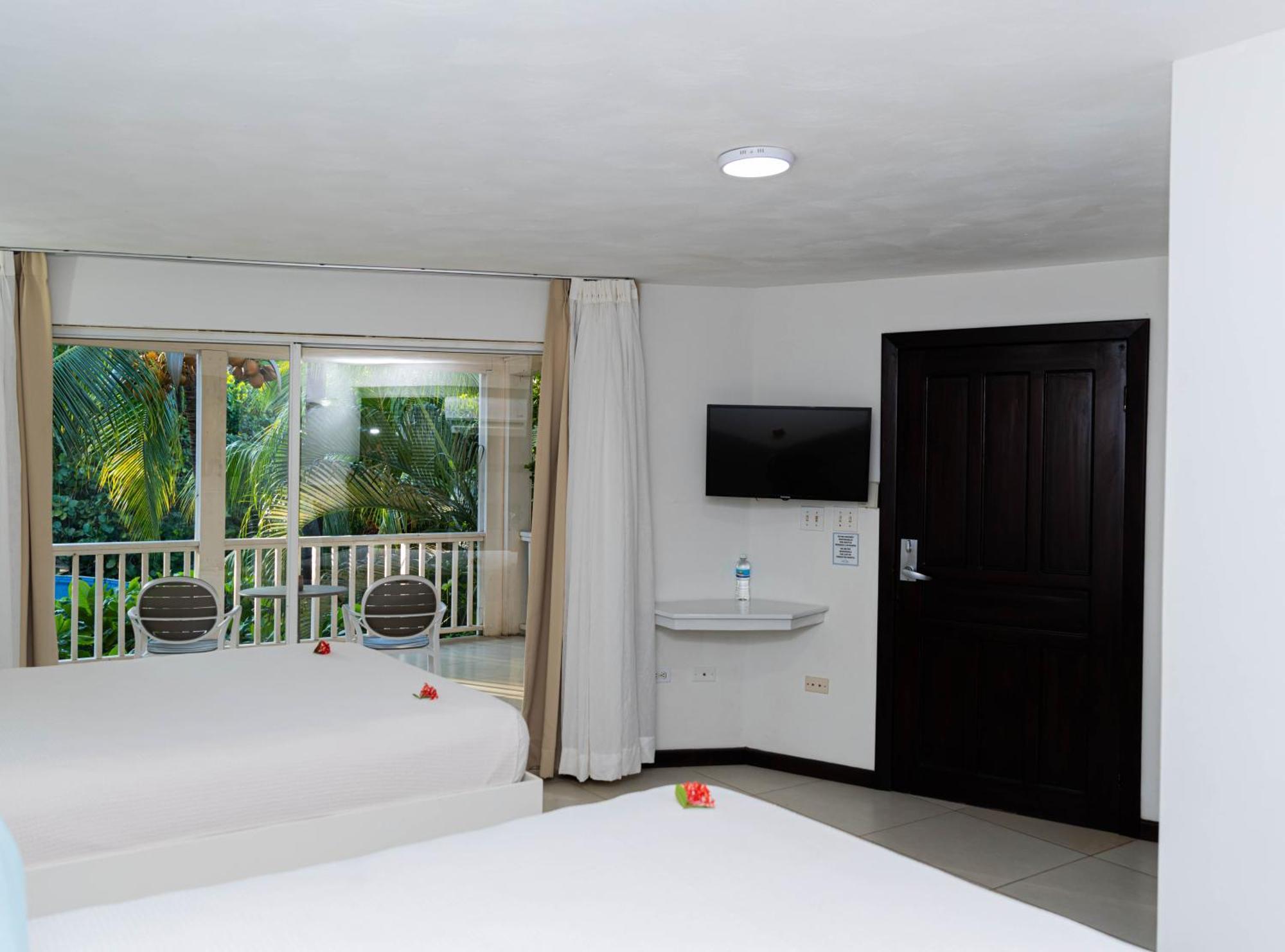 Paradise Beach Hotel & Resort West Bay Bilik gambar